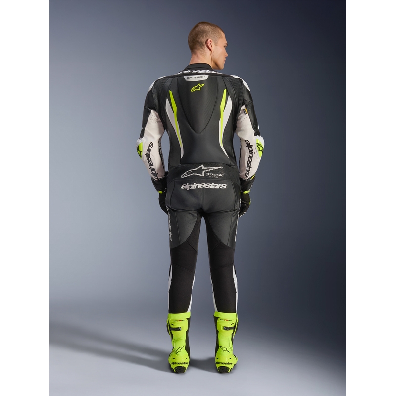 Combinaison de moto Alpinestars GP TECH V5 en cuir monobloc noir-blanc-jaune fluo